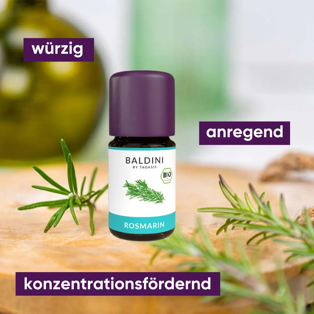 Baldini Bio Rosmarinöl, würzig, anregend und konzentrationsfördernd, mit Rosmarinzweigen.