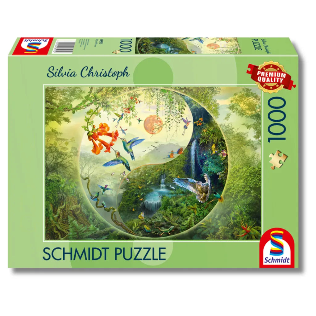 Schmidt Puzzle 1000 Teile "Im Wald der Kolibris" von Silvia Christoph. Produktverpackung mit faszinierendem Dschungelmotiv im Yin-Yang-Design, vielen Kolibris und Wasserfall.
