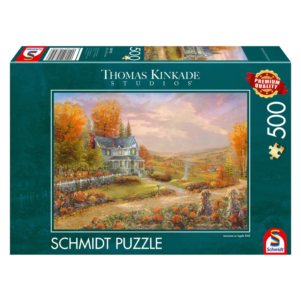 Karton des 500-Teile Schmidt Puzzles 'Autumn at Apple Hill' aus den Thomas Kinkade Studios mit einem idyllischen Herbstmotiv.